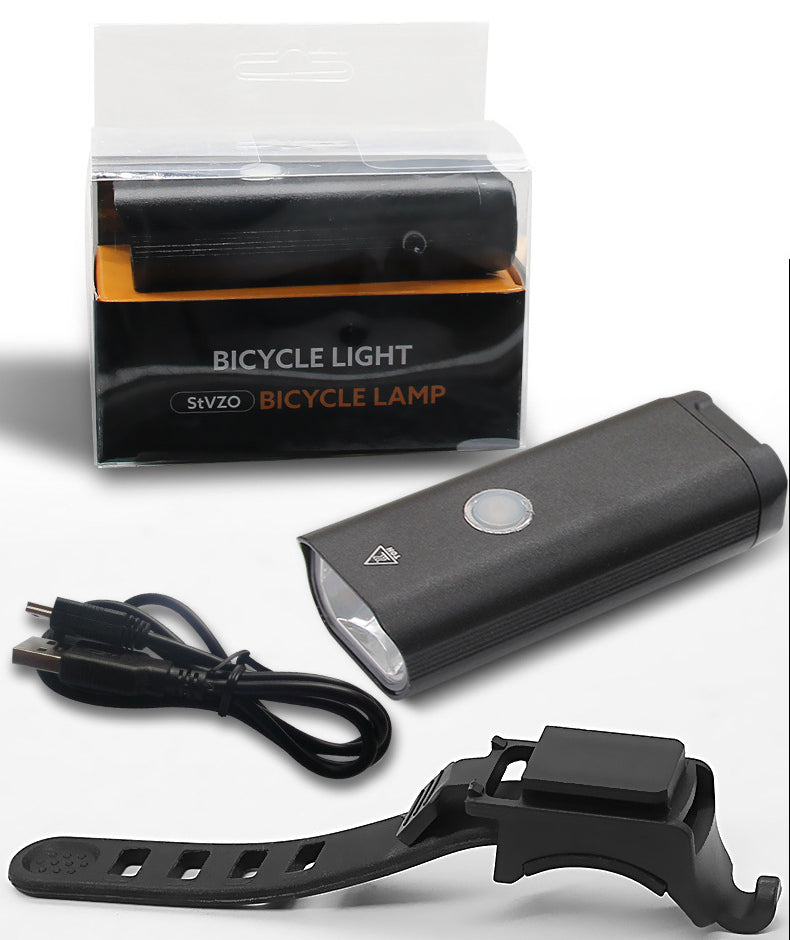 Black 400-lumen bicycle front light kit on white