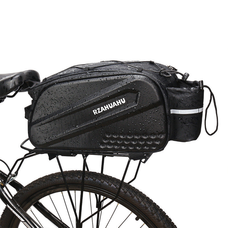 Black structured bag installed on a bicycle rear rack
