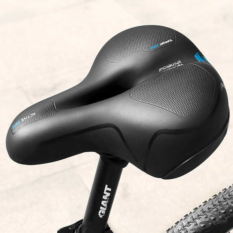 Blue-accent comfort bicycle saddle installed on a bicycle