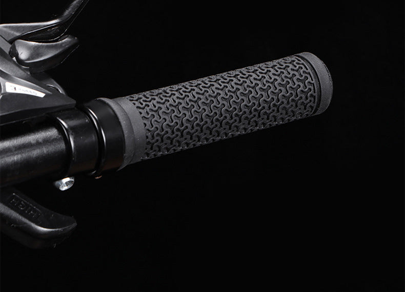 Black textured grip installed on a bicycle handlebar