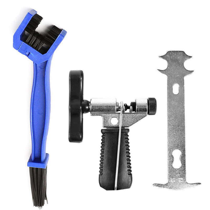Chain breaker, gauge and blue brush kit on white