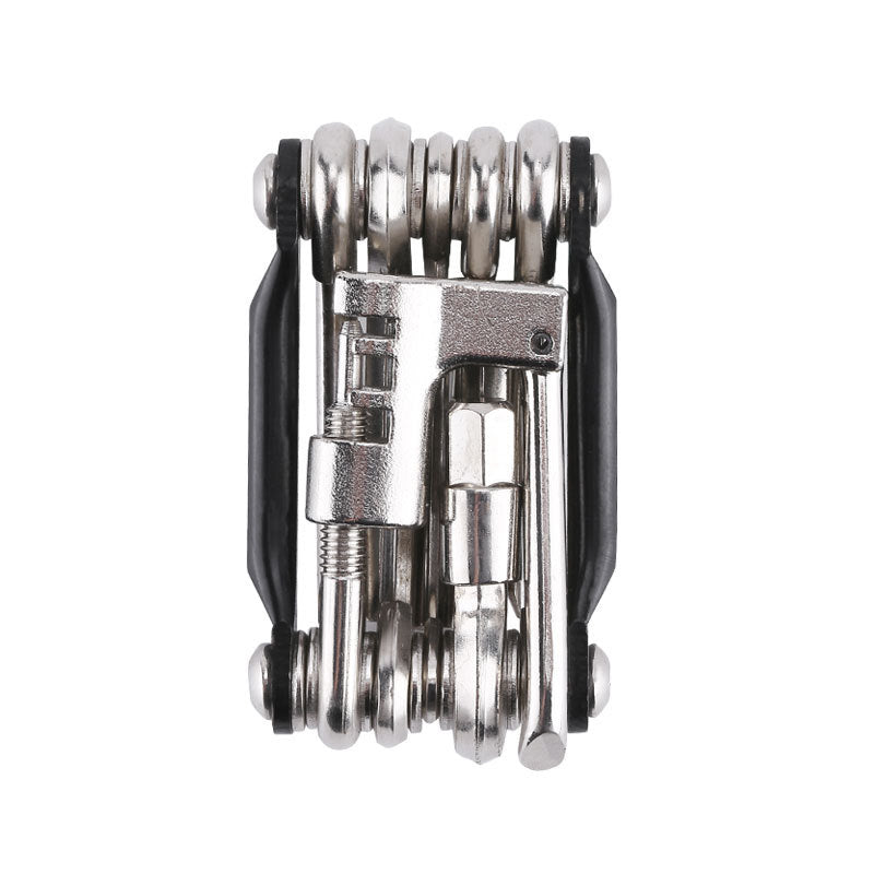 Black compact bicycle multi-tool on white