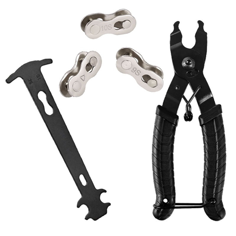 Link pliers, three connector links and black gauge kit on white